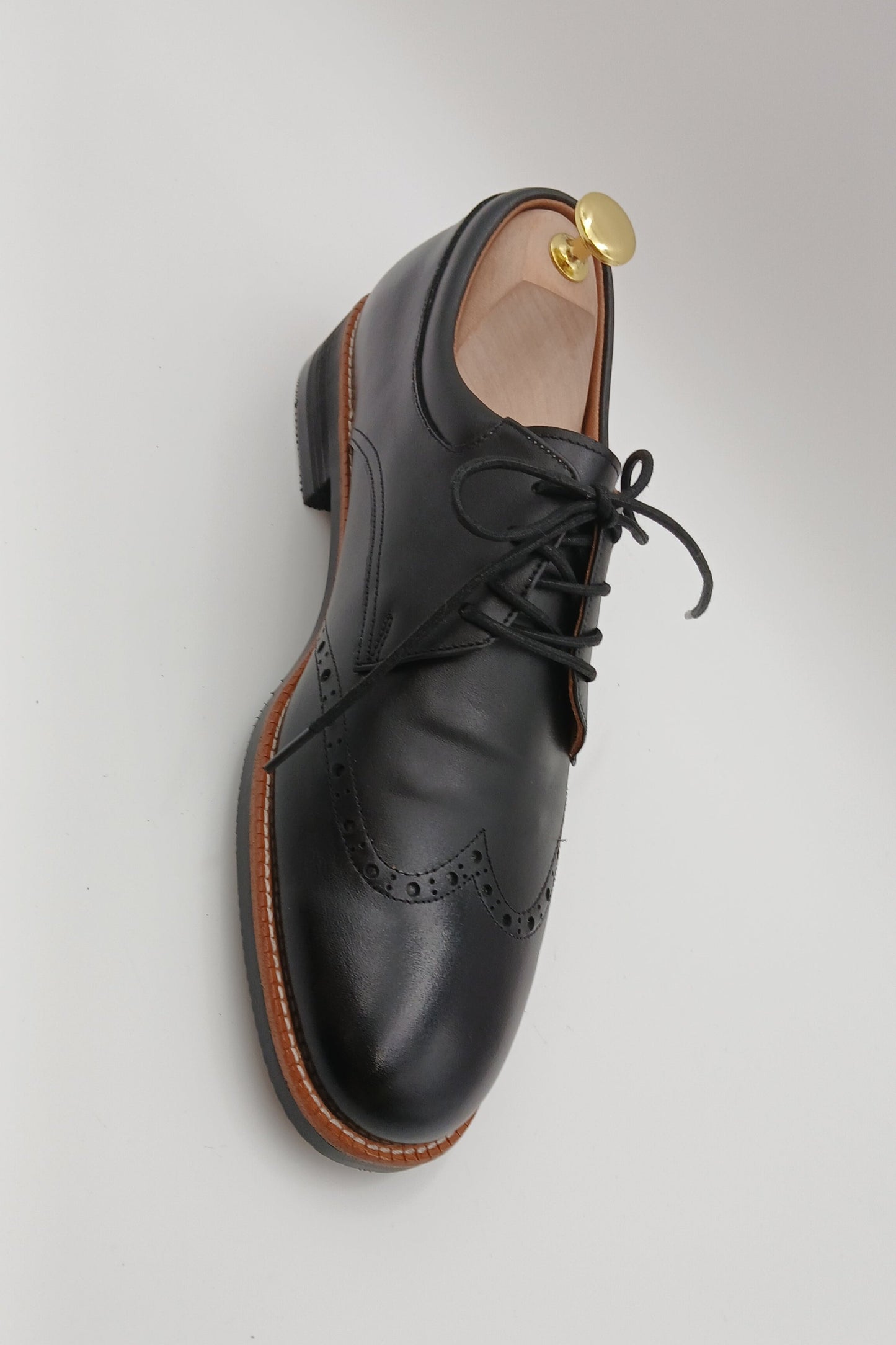 Onyx Wingtip Derbies